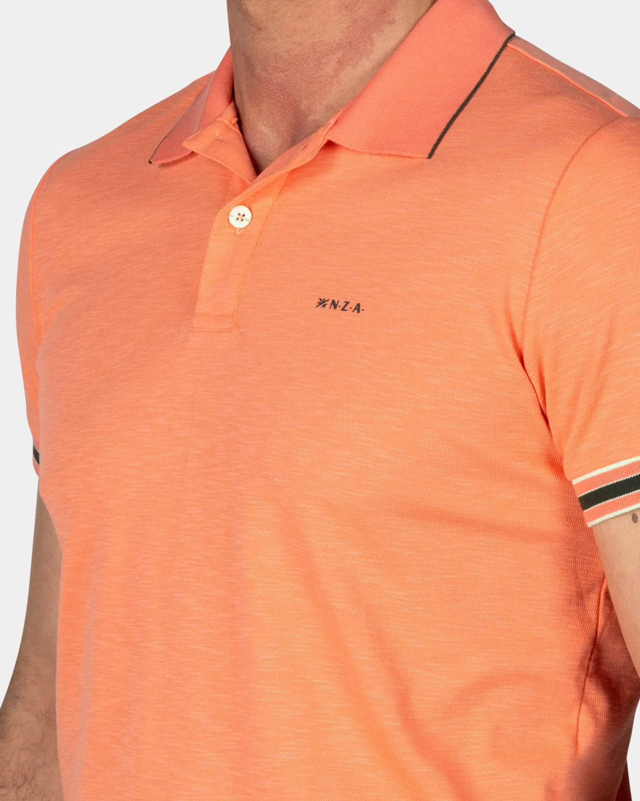 NZA New Zealand Auckland Basic oranje effen polo