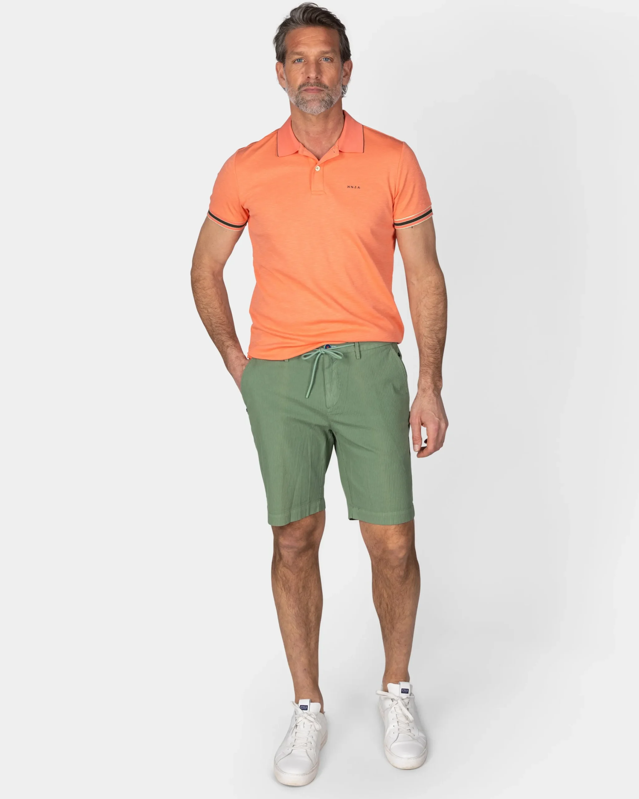 NZA New Zealand Auckland Basic oranje effen polo