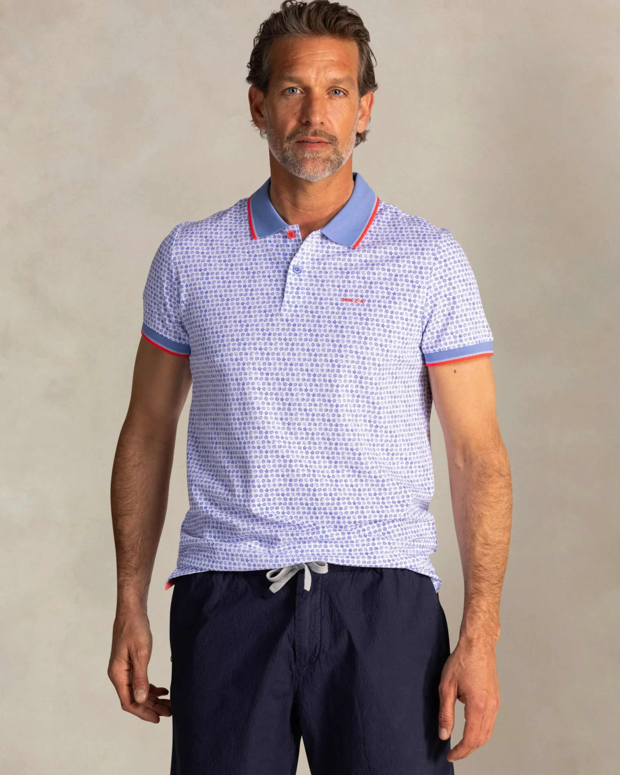 NZA New Zealand Auckland Blauwe katoenen polo met grafische print