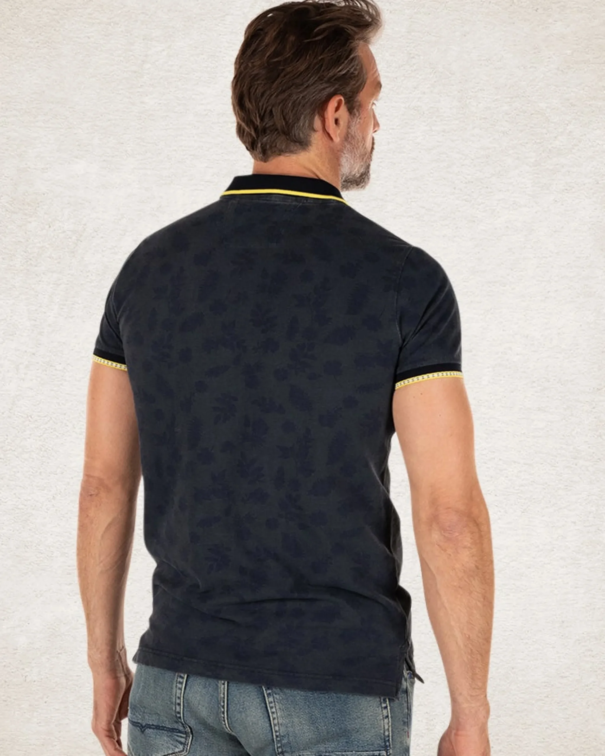 NZA New Zealand Auckland Donkerblauwe polo met bladprint