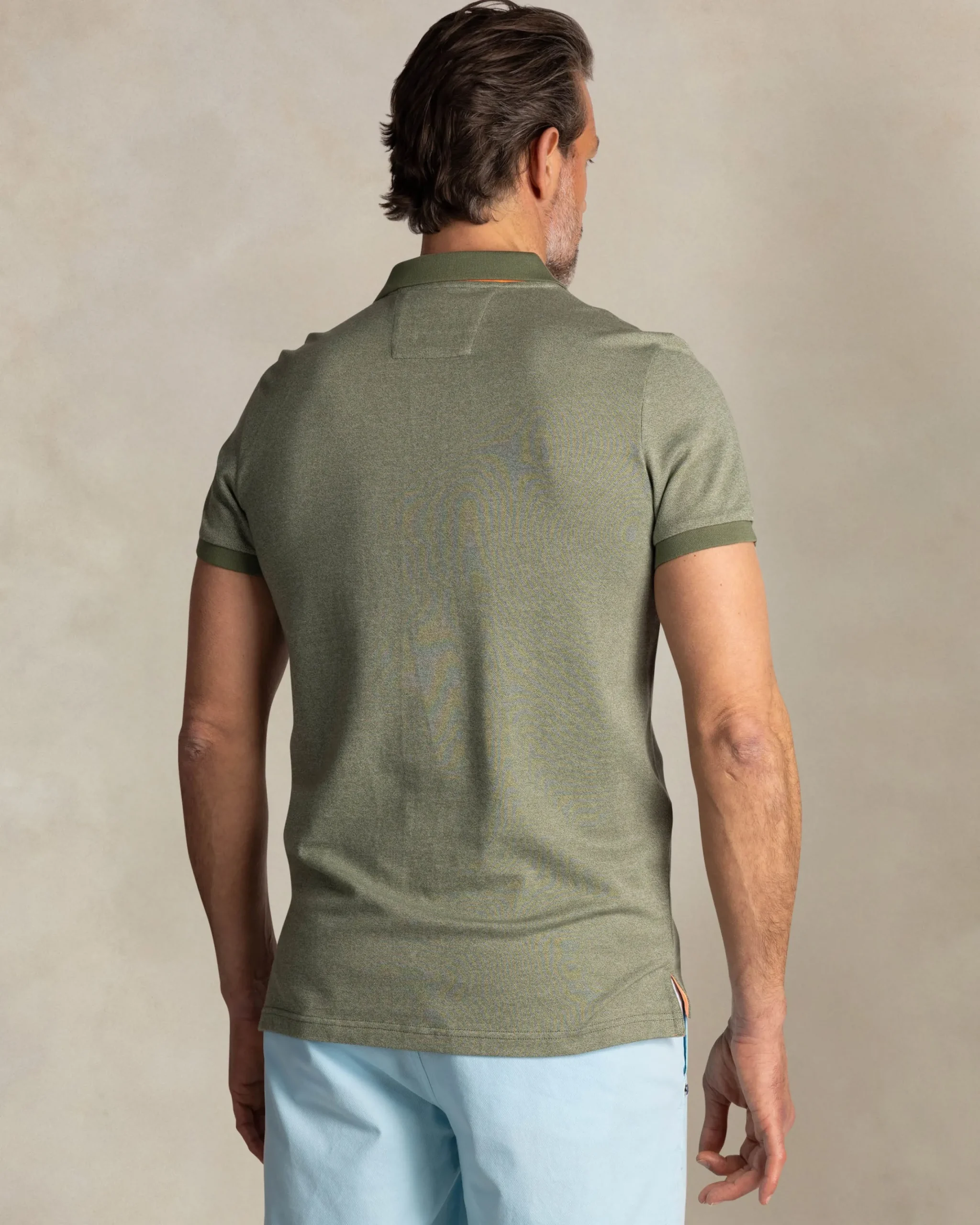 NZA New Zealand Auckland Effen groene polo met oranje details