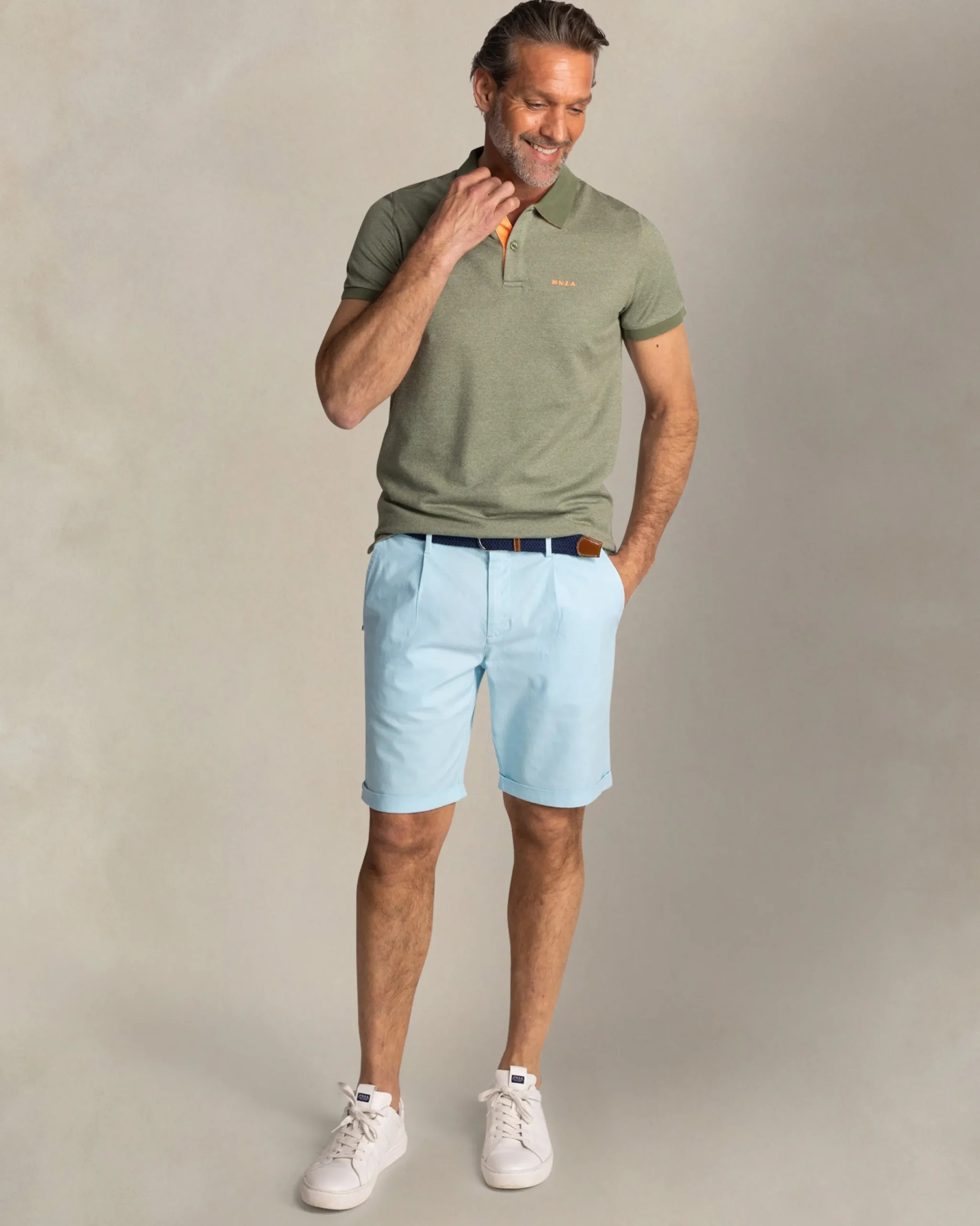 NZA New Zealand Auckland Effen groene polo met oranje details