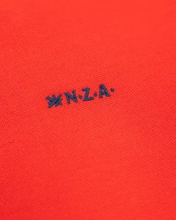 NZA New Zealand Auckland Effen katoenen roodoranje polo
