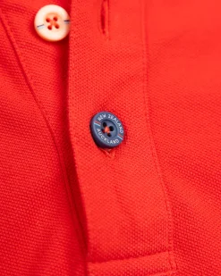 NZA New Zealand Auckland Effen katoenen roodoranje polo