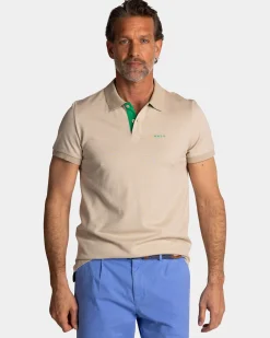 NZA New Zealand Auckland Effen lichtbruine polo met groene details