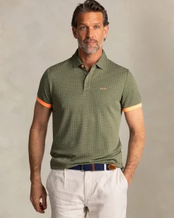 NZA New Zealand Auckland Groene polo met kleine oranje stippen