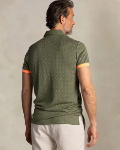 NZA New Zealand Auckland Groene polo met kleine oranje stippen