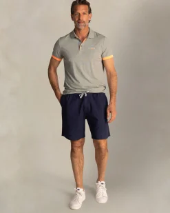 NZA New Zealand Auckland Groene polo met oranje details