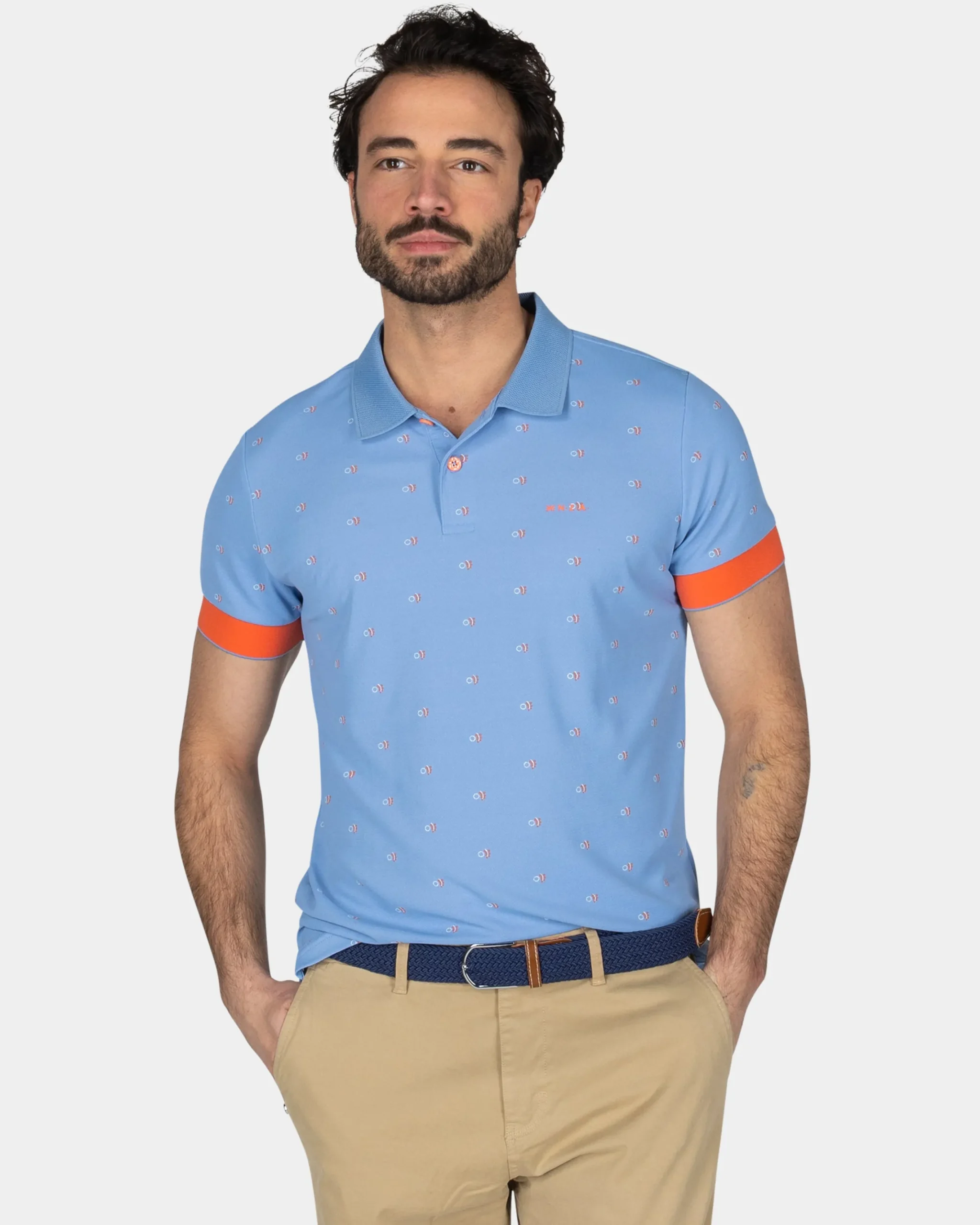 NZA New Zealand Auckland Lichtblauwe polo met oranje accenten
