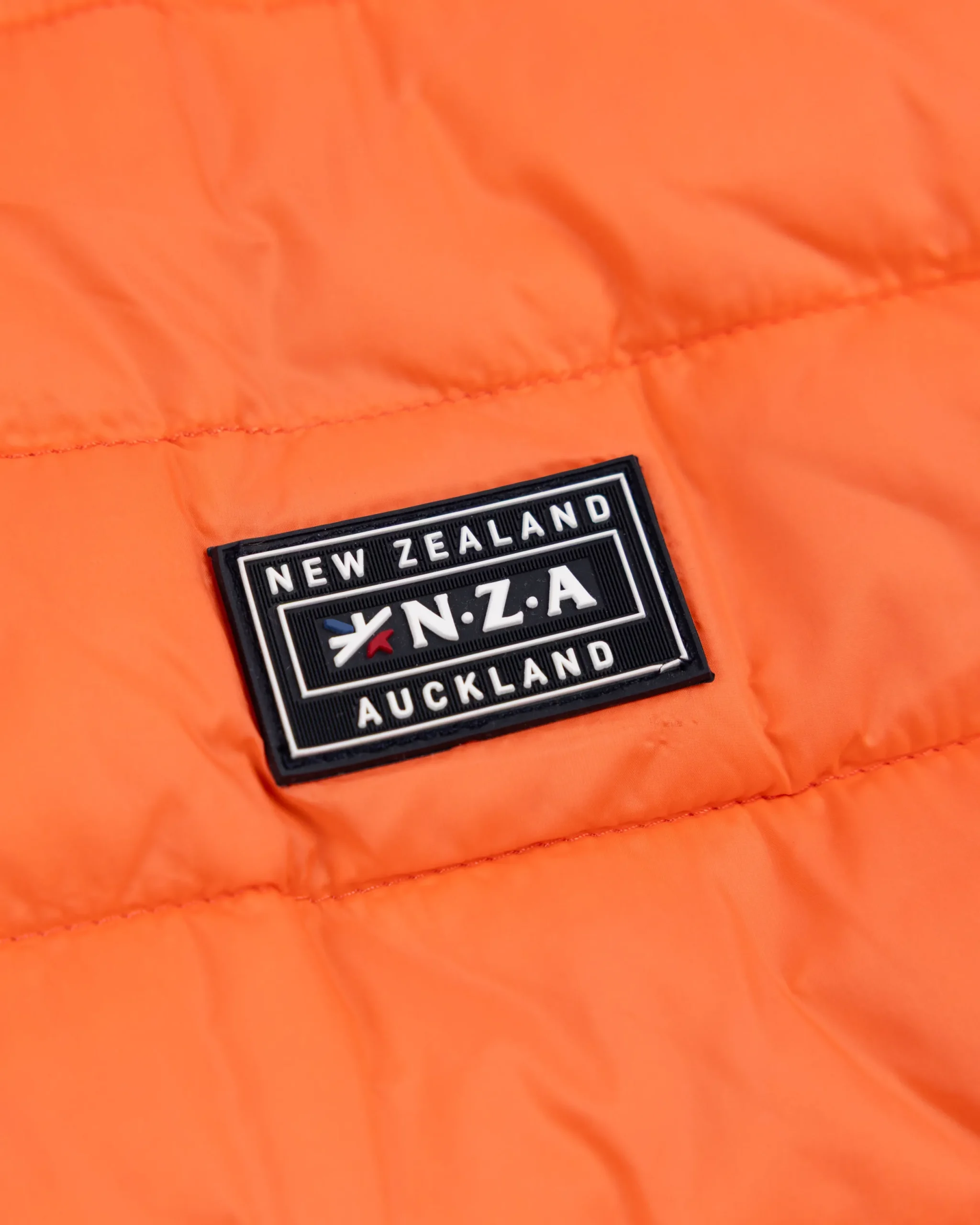 NZA New Zealand Auckland Oranje bodywarmer