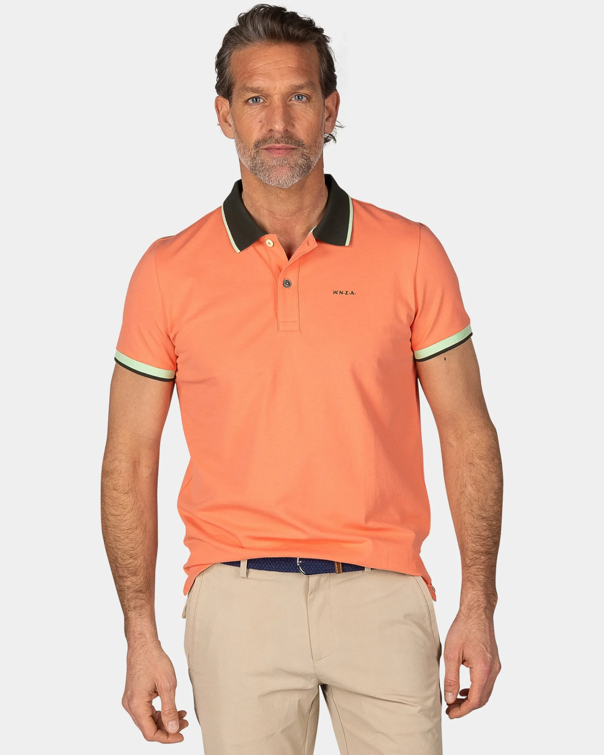 NZA New Zealand Auckland Oranje polo met blauwe kraag