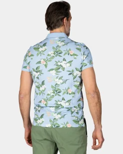 NZA New Zealand Auckland Pastelblauwe polo met grote bloemenprint